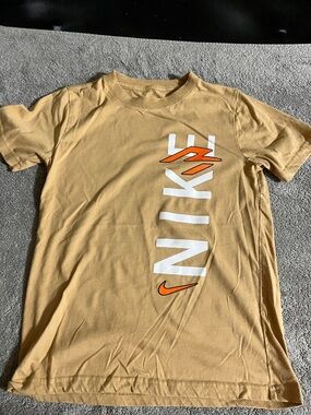 Nike Men's Short-Sleeve Tee in Tan with Orange and White Logo